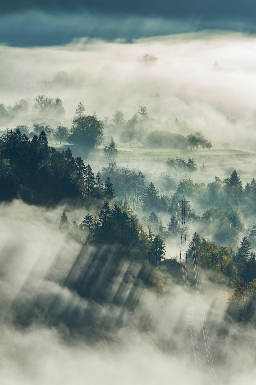 Transmission towers in fog