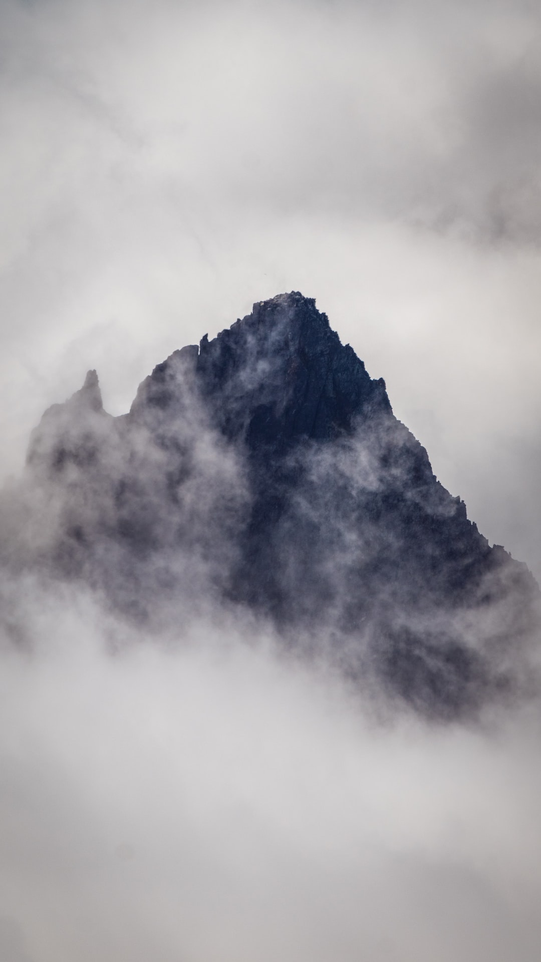 Lonely mountain in the clouds