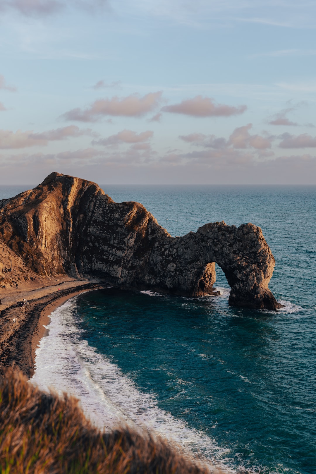 Landscape photo of Durdle Door at sunset