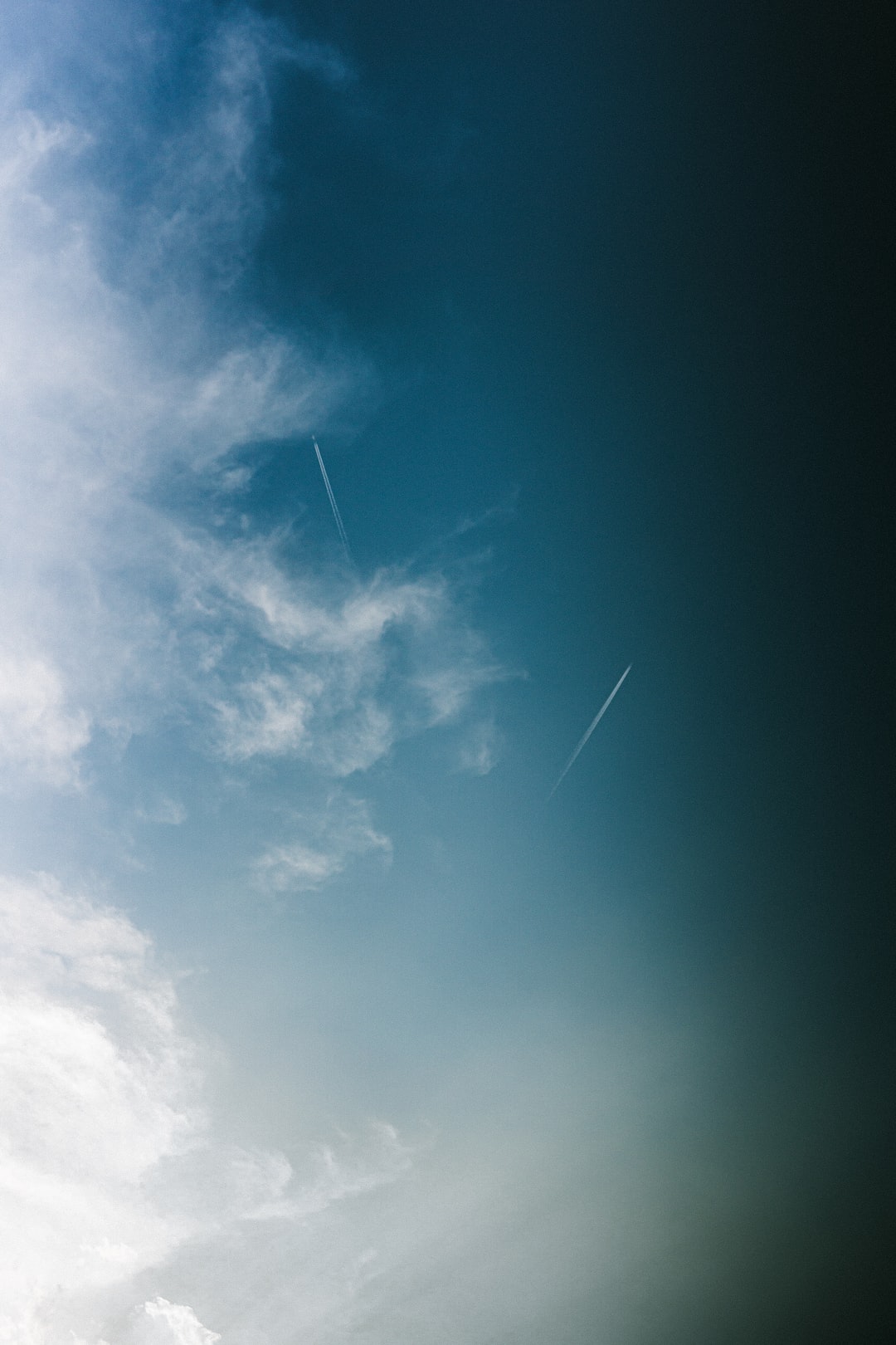 Simple photo of 2 jets in the sky I took from my roof-top.