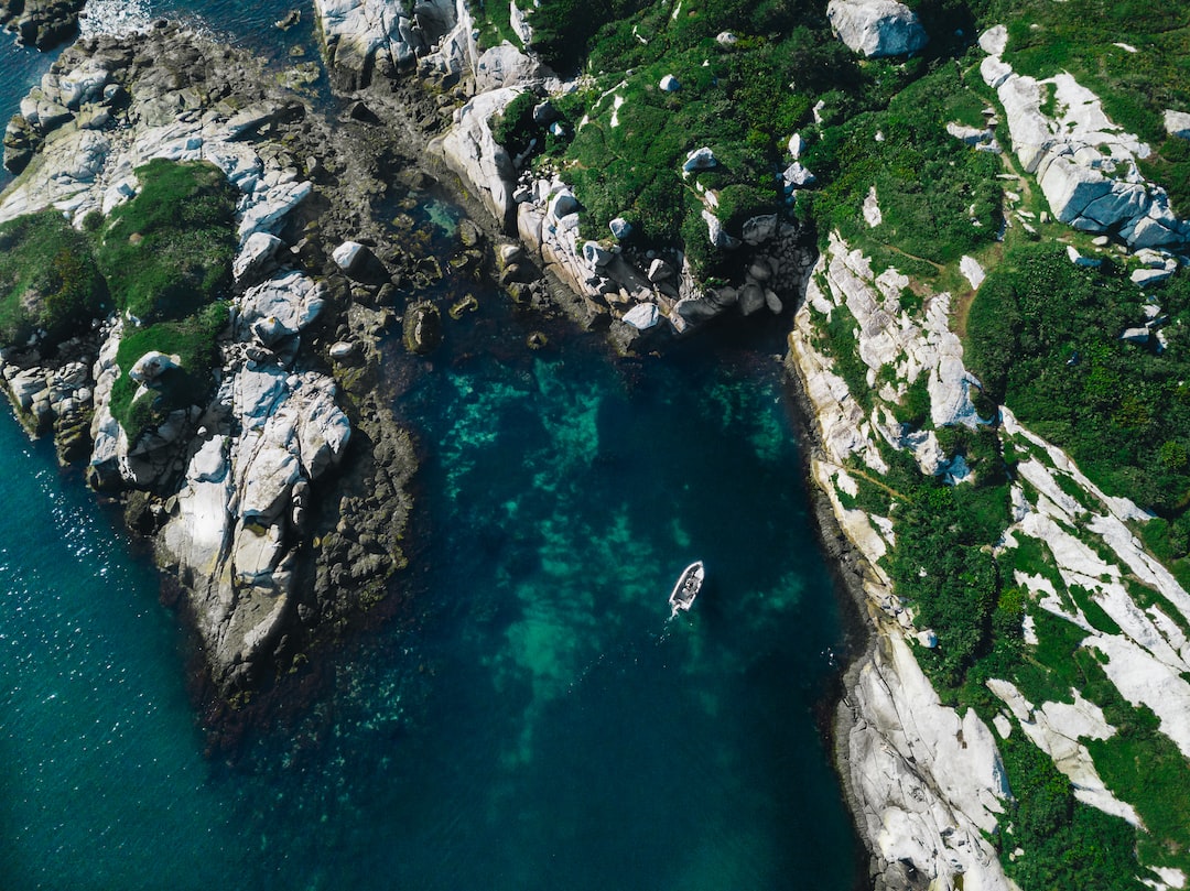 Looking down on a boat that come from a cabin on a private island off the coast of Nova Scotia. What I’d do to have a camp on a private island.