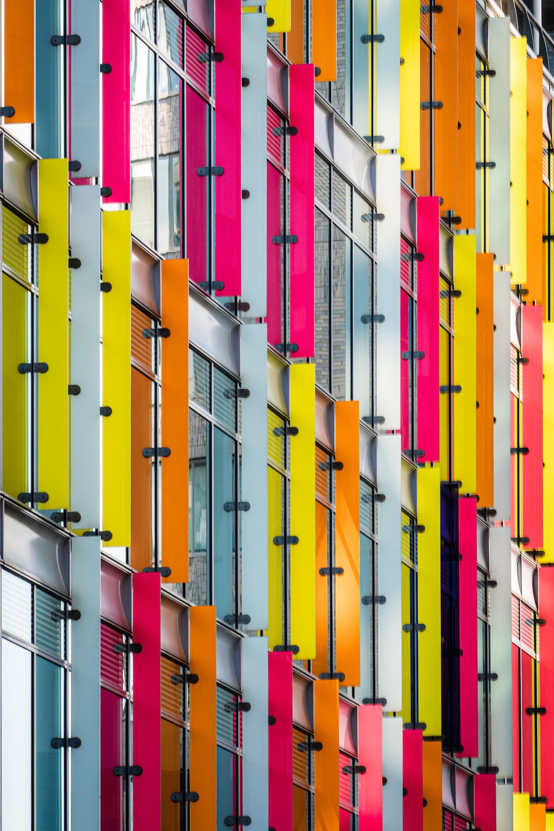 A housefront in the Amsterdam Business District with colorful window separators