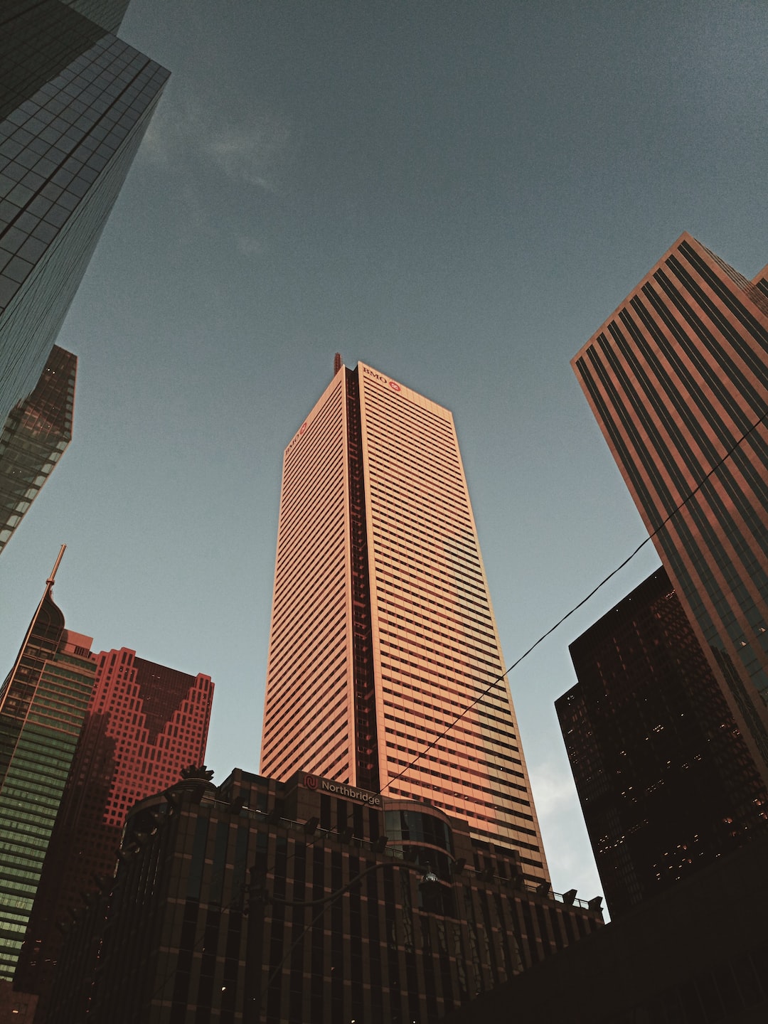 white BMO building during sunset