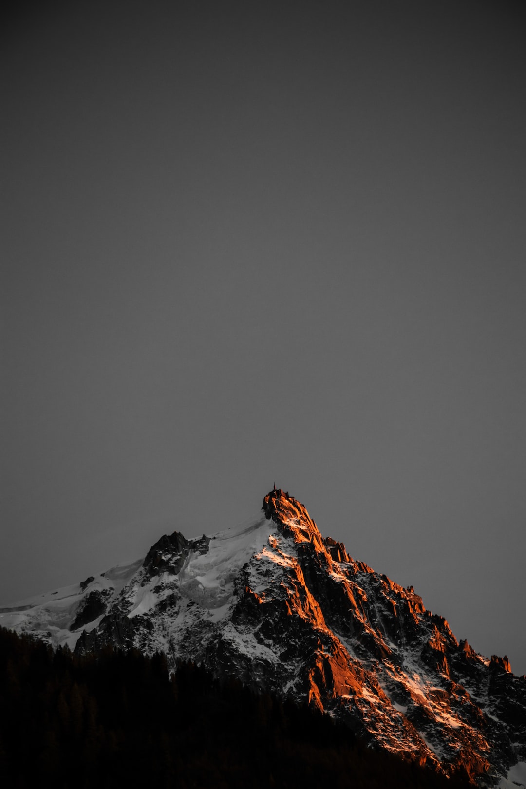 Mountain peak illuminated by the sunset