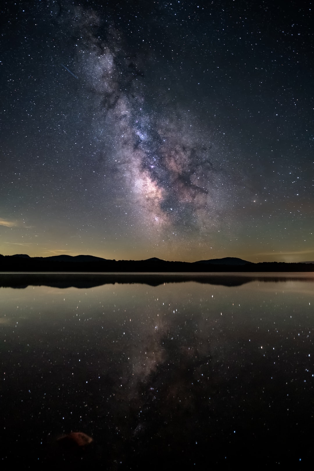 Clear milky way with water surface reflection. Shot at Indian Lake, NY.                                 繁星璀璨妆满天 银河浩瀚把镜填