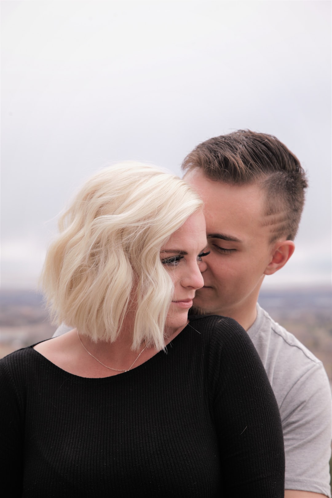 My 100th photo uploaded to Unsplash. Portrait of a young couple in love.