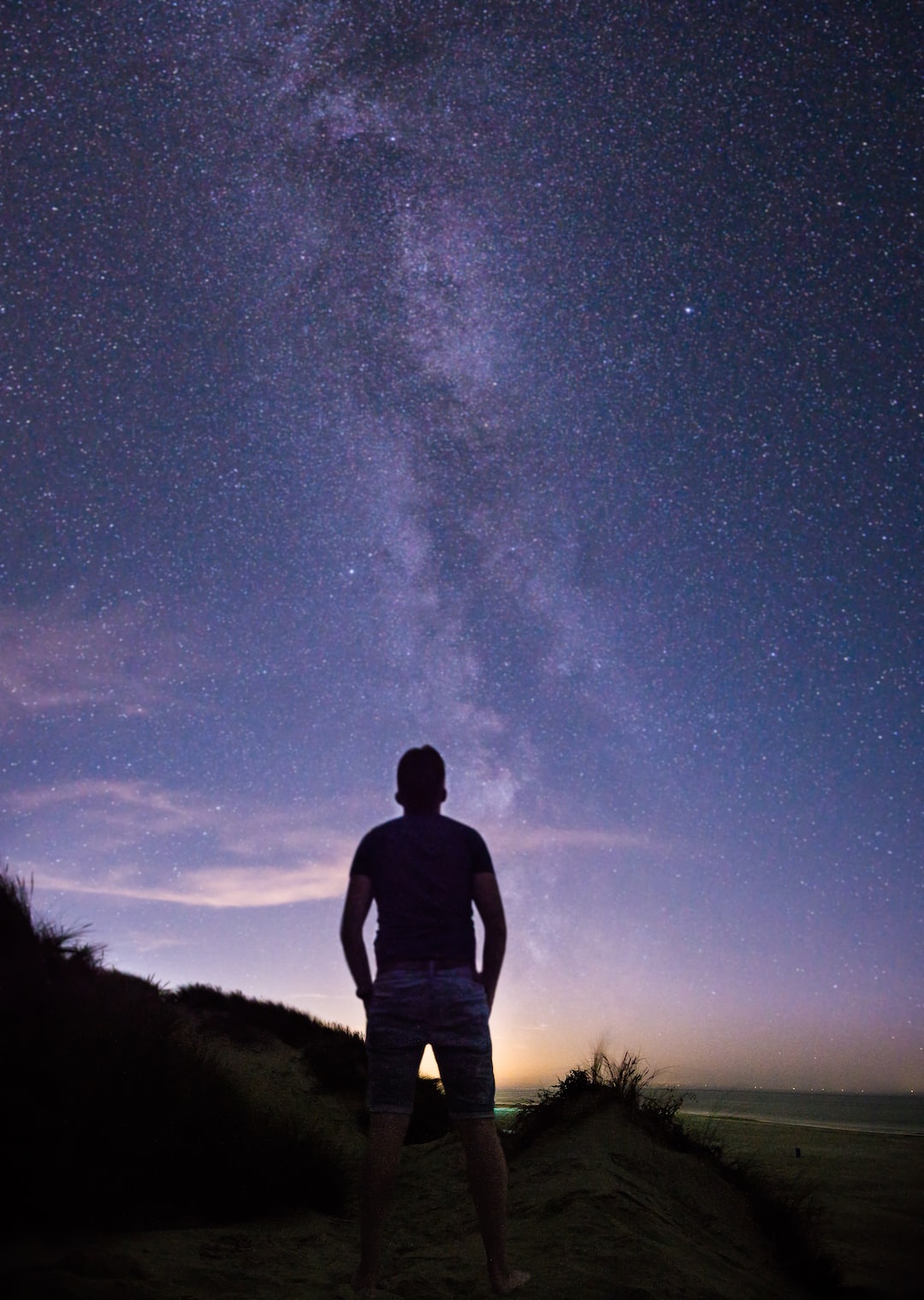 Ameland is one of the few places in the Netherlands where the light pollution is so low, you can easily see the Milky Way with the naked eye. Shot at the western side of the island, near Hollum, on a sandy dune.