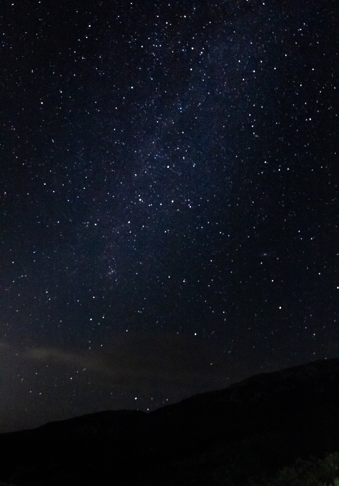 Long exposure shot of the starry sky on a summer night near Ohrid Lake