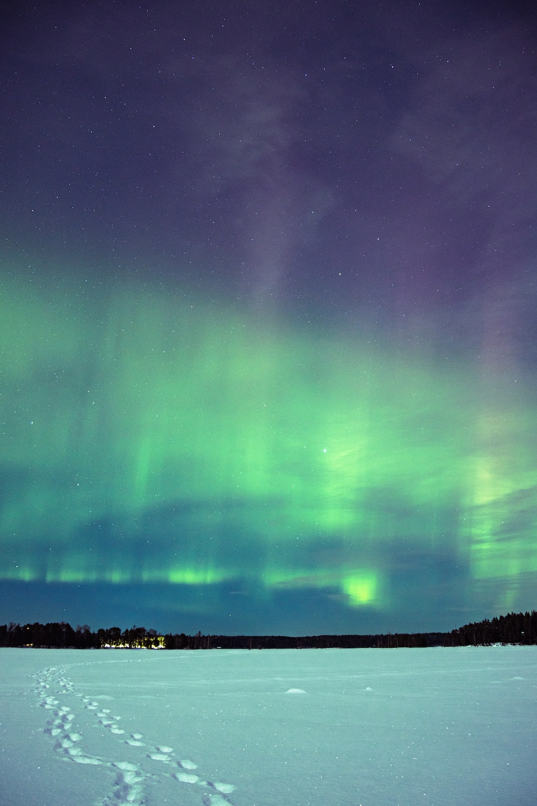 Northern lights over frozen lake Näsijärvi, Tampere.