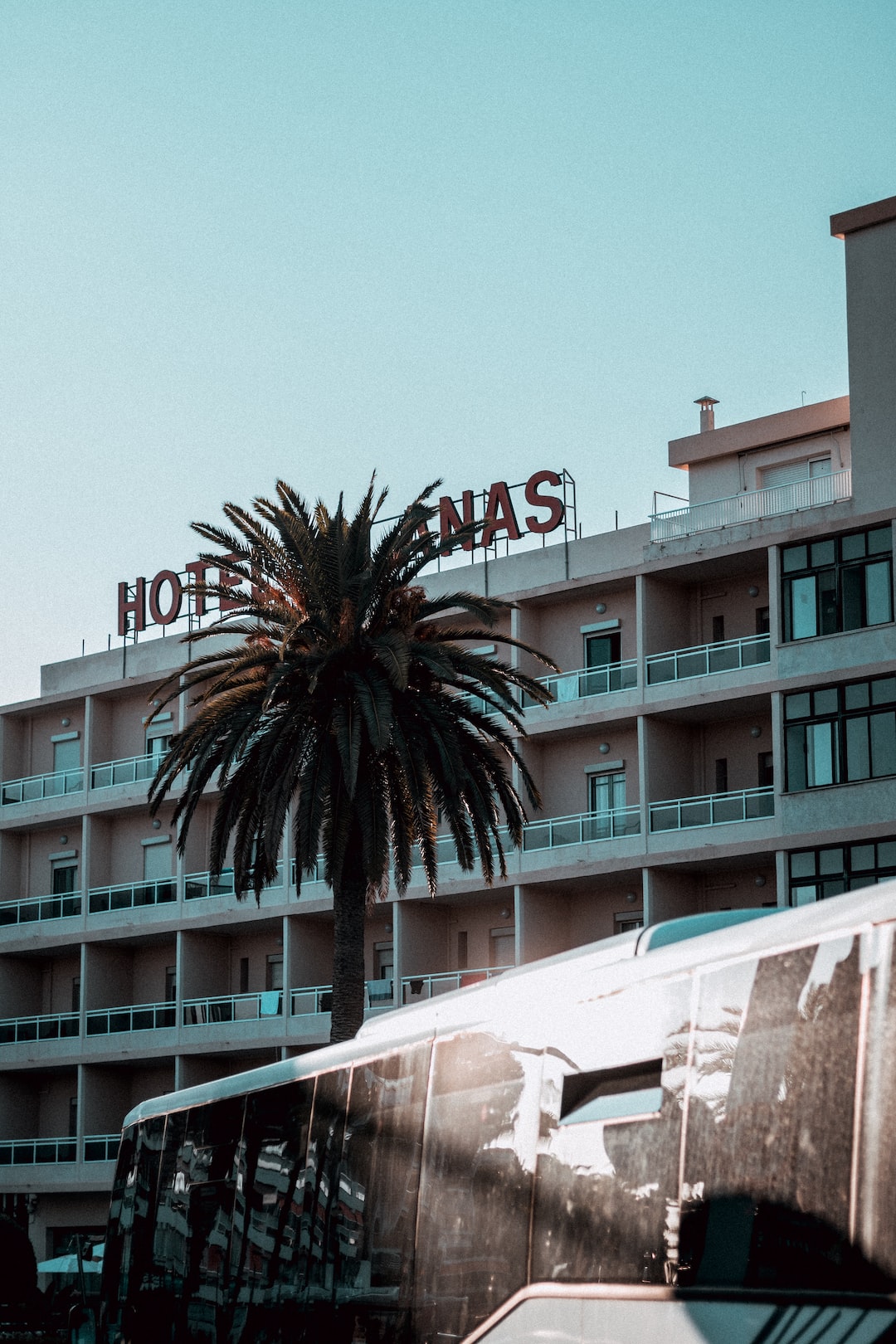 Hotel in Salou with a bus driving in front