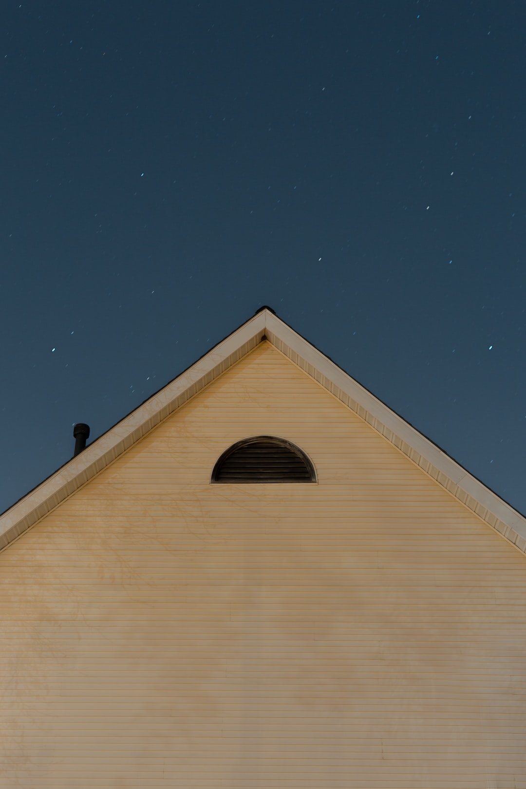 minimalistic shot of house at night