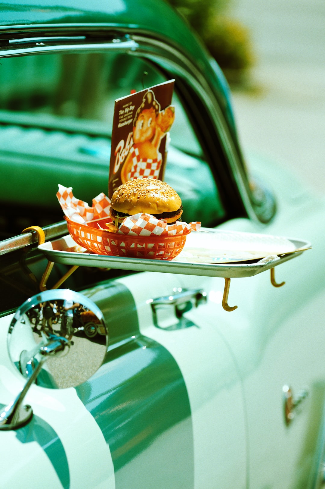 It is fake burger and car that belongs to some other epoch but still it has a unique attraction. Bon Appétit!