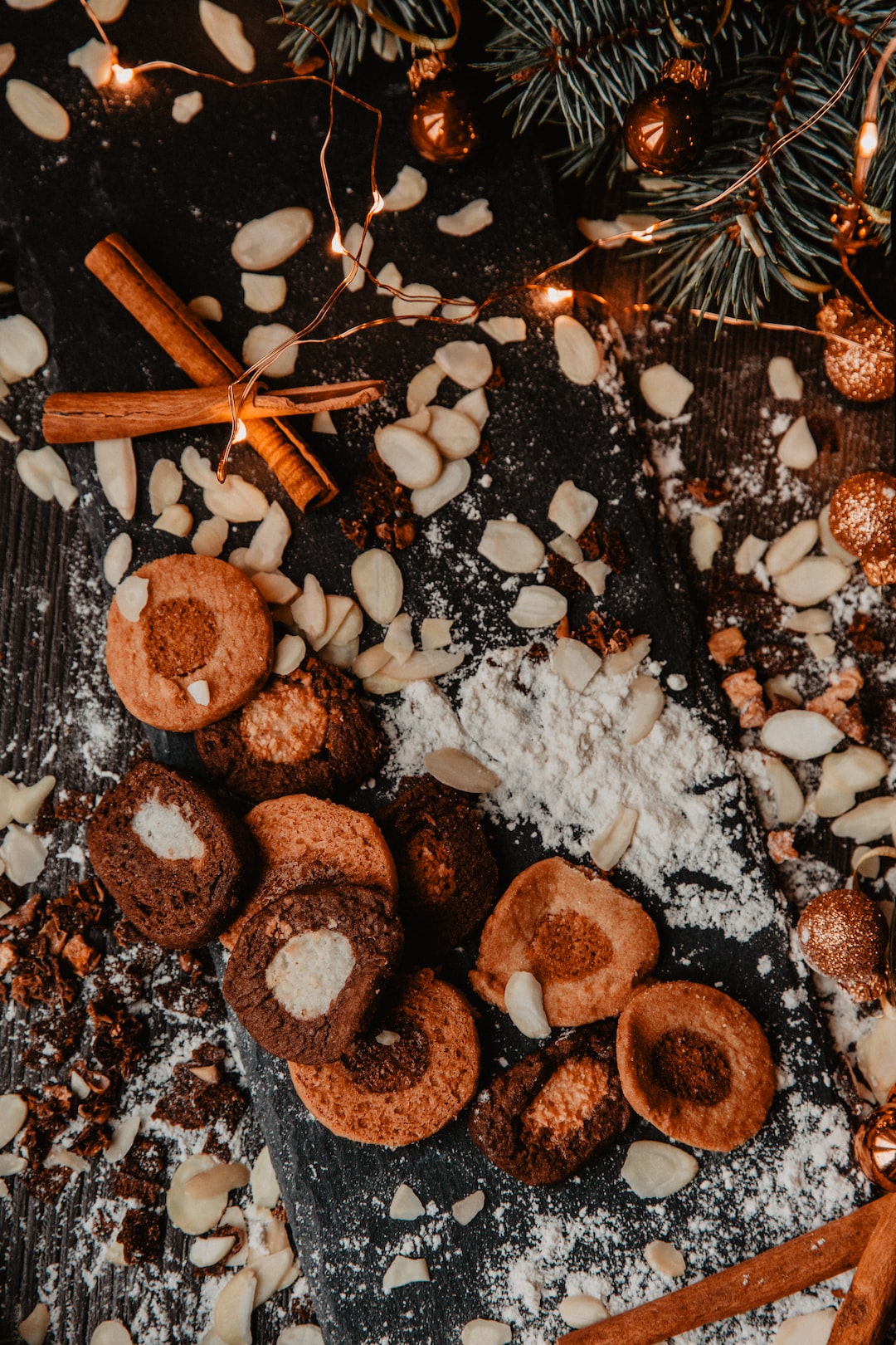 Gingerbread cookies on wooden table with Christmas ornaments