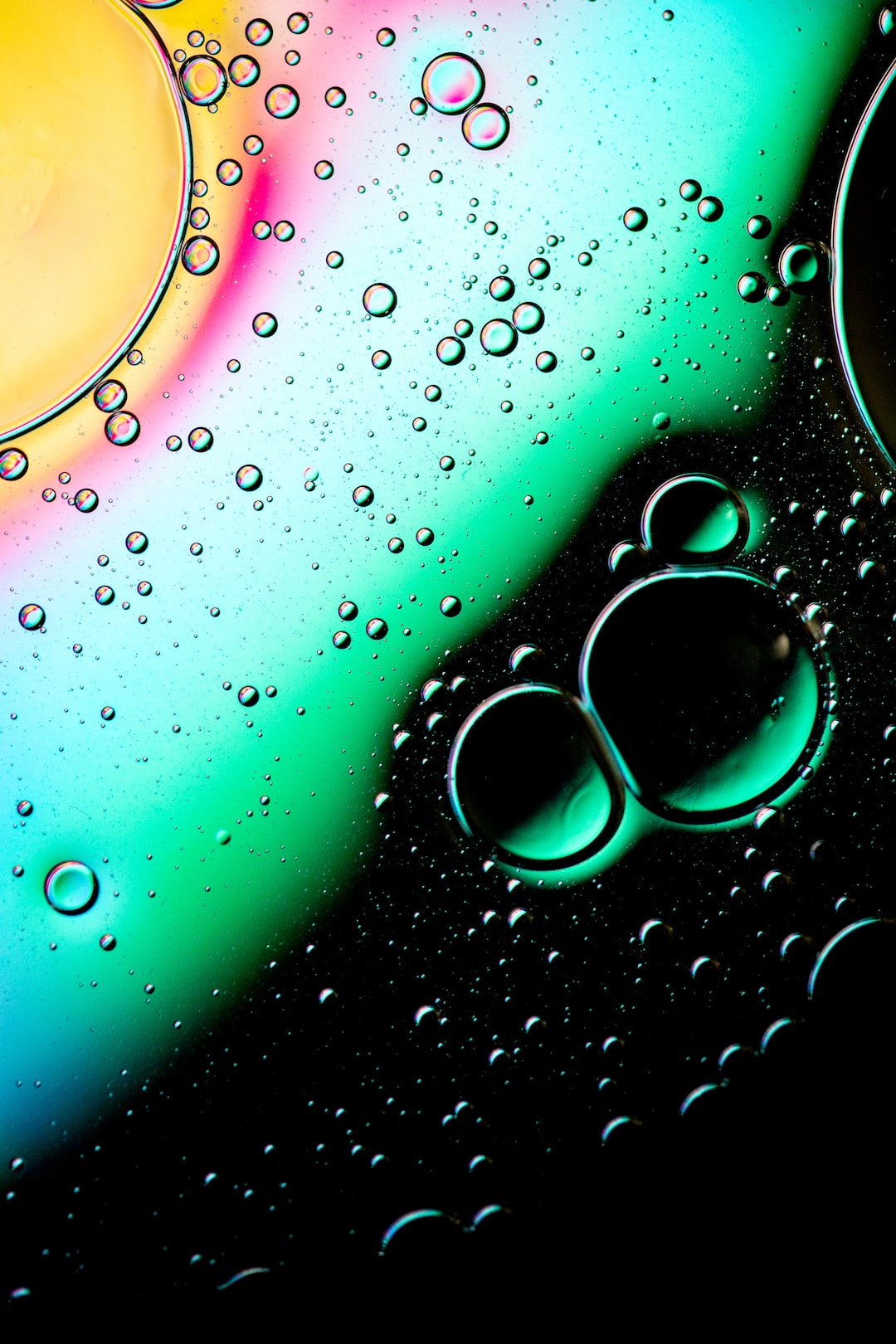 Water and oil droplets on glass panel