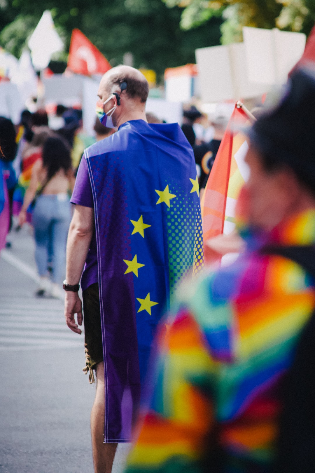 Man with full body European Union flag during Christopher Street Day (CSD) 2021 in Stuttgart, Germany