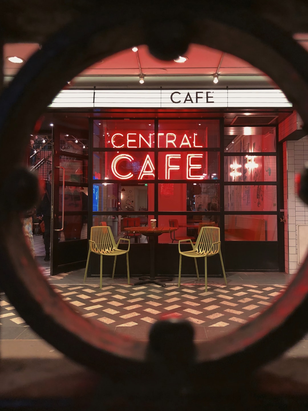 Neon lights of the Central Cafe on Piccadilly Street in London