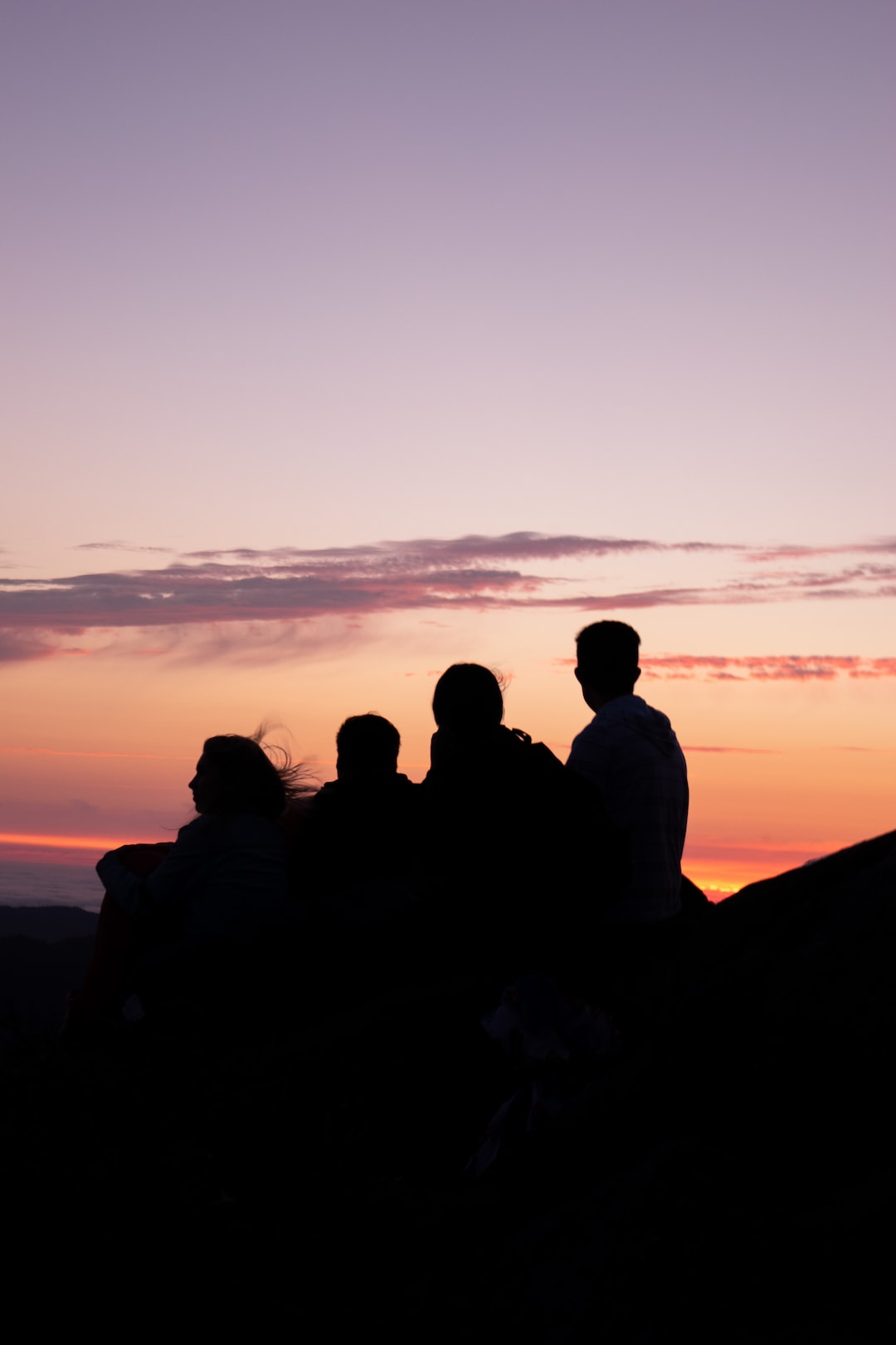 Silhouette of friends at Mt. Tamalpais at sunset