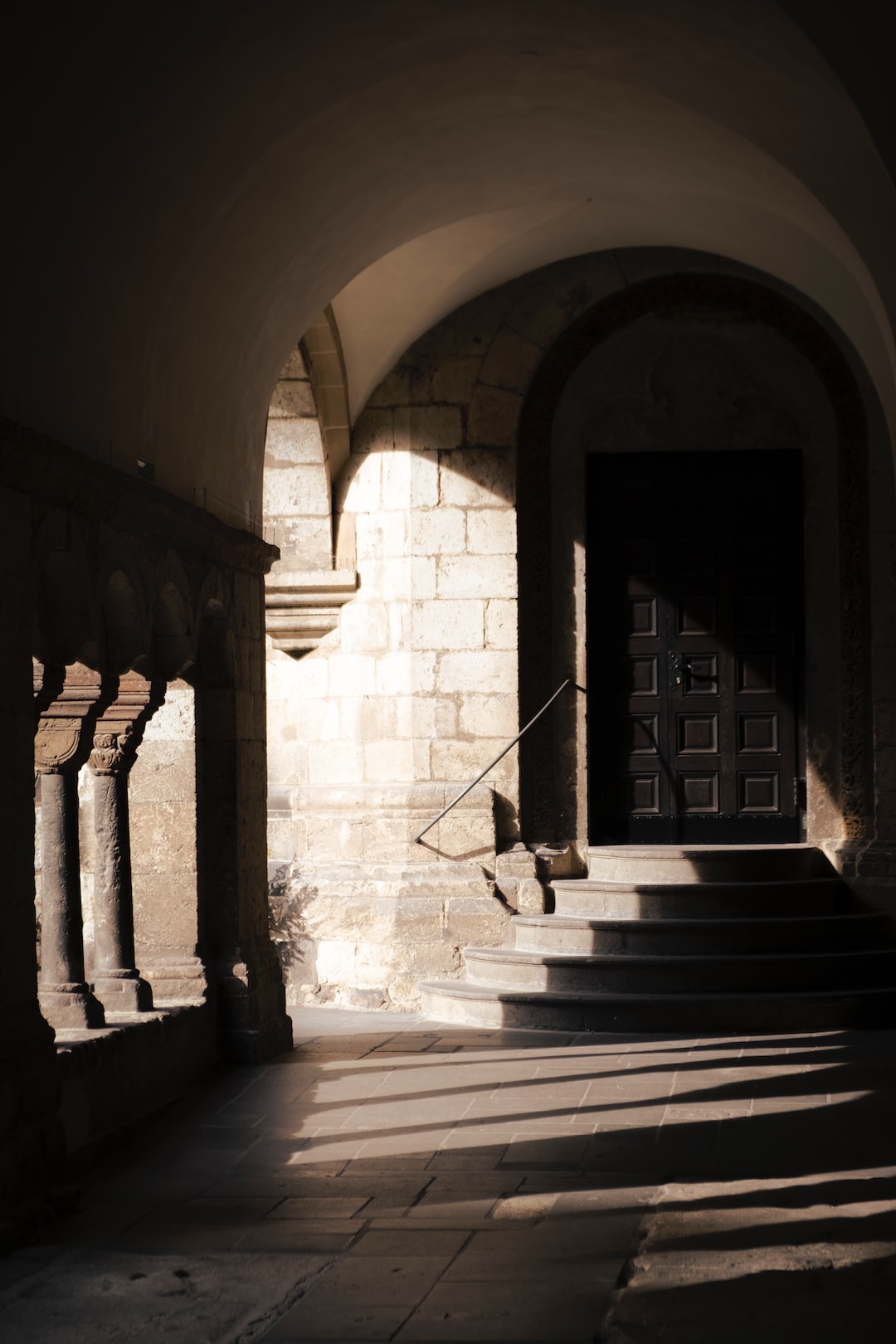 In the shadows by the church