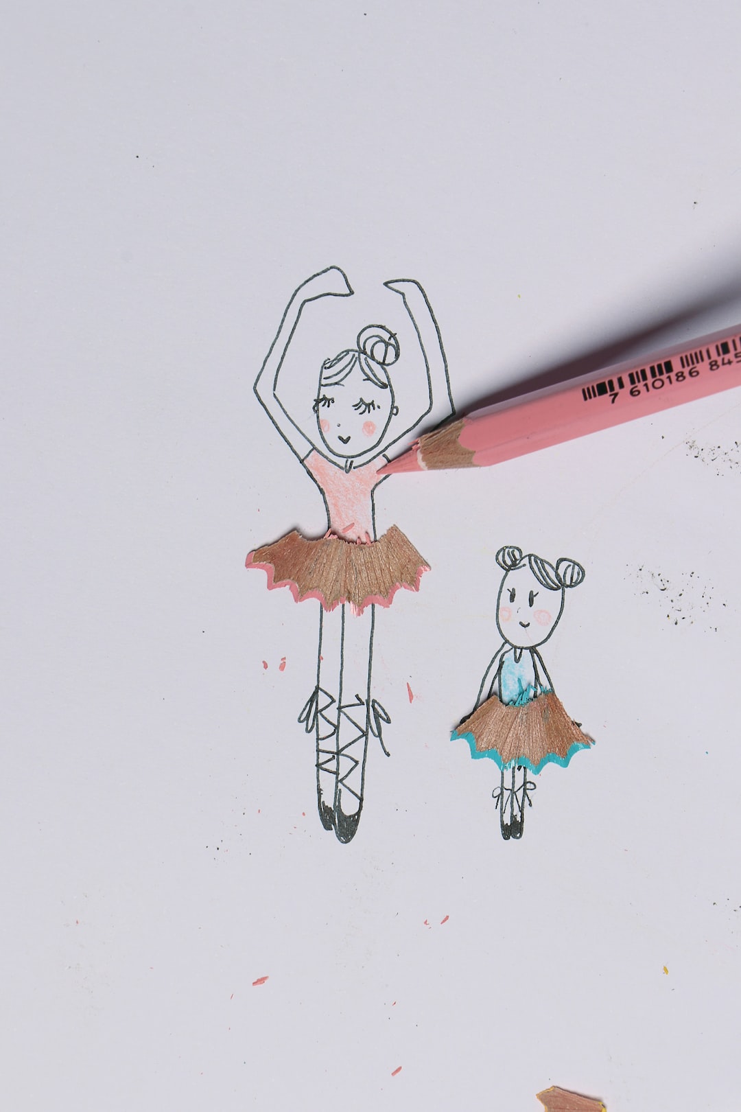 creative doodle art of dancing ballerinas on paper.