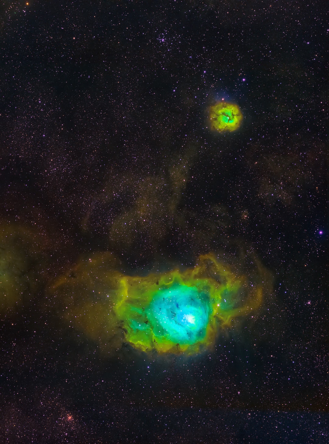 Dive into the “Lagoon” and “Trifid” nebulae