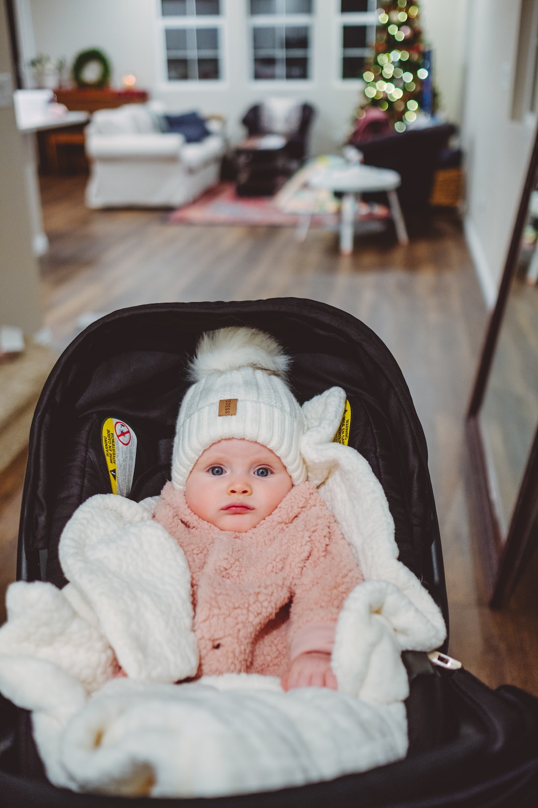 The coziest baby lady. Heading out to look at Christmas lights around the neighborhood. 