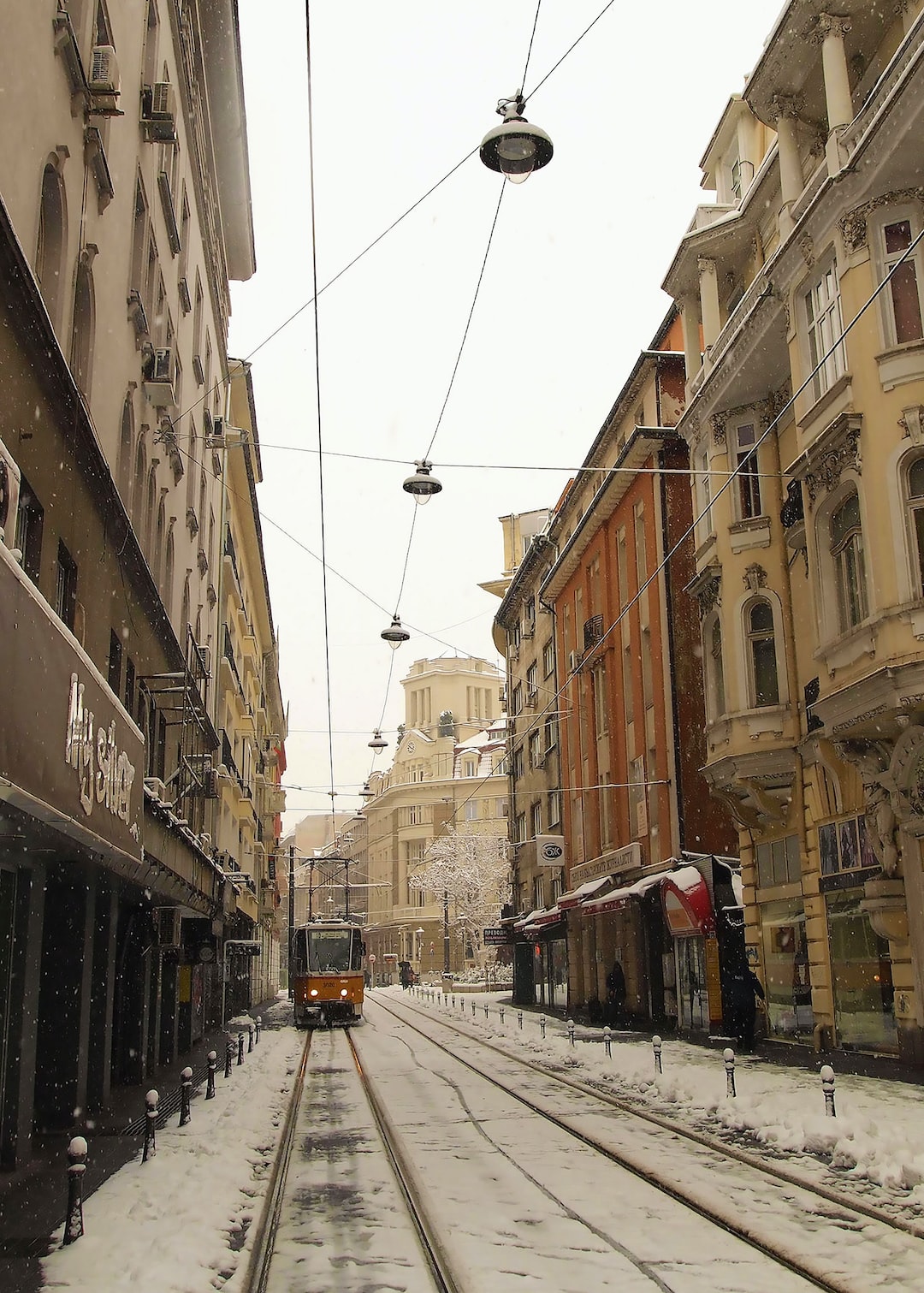 Snowy Street in Sofia with a Tram