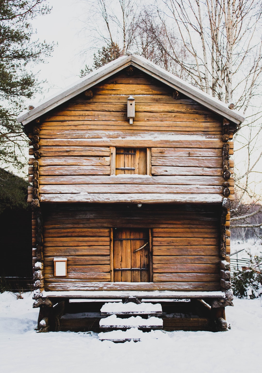Two level wooden winter chalet