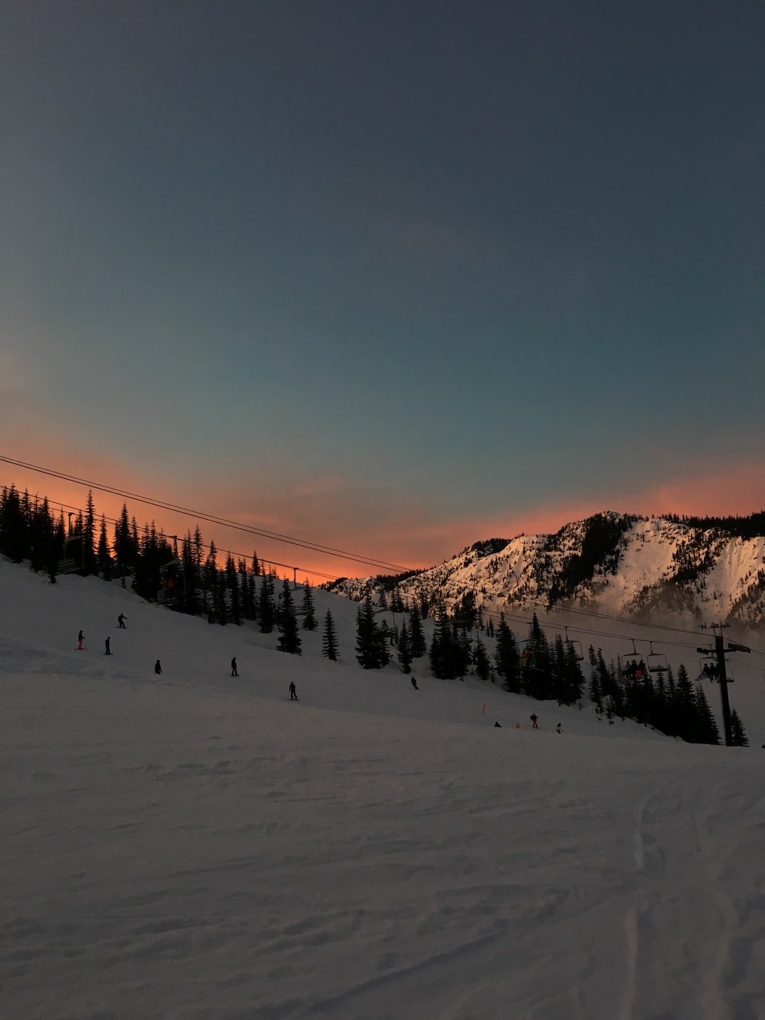 going snowboarding in the mountains in washington, came across a beautiful sunset as a lovely background for the mountain range.
