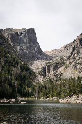 dream lake in rmnp, colorado is just beautiful. if you look closely you can see two elk crossing the lake.