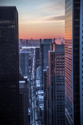 Sunset over the busy city