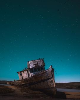 The Point Reyes shipwreck under a clear night sky.