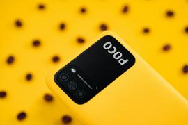 pocophone m3 flatlay yellow background with coffee beans