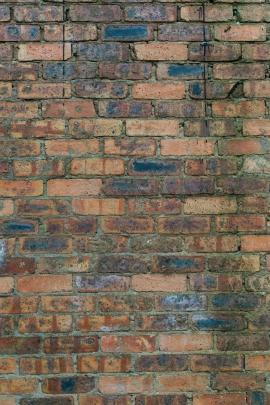 Texture wall- brick, orange & blue tones.