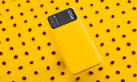 pocophone m3 flatlay yellow background with coffee beans