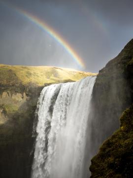 Rainbow over a waterfall