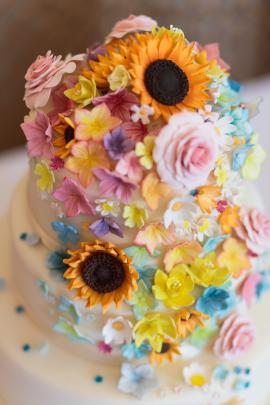 Colourful sunflower wedding cake