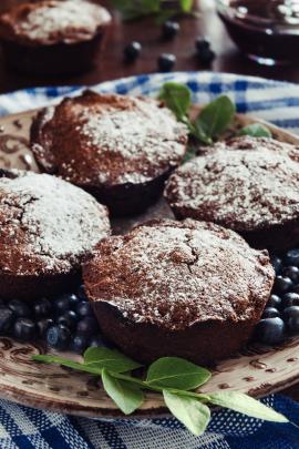 Brown chocolate muffins and blue berries