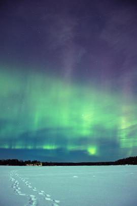 Northern lights over frozen lake Näsijärvi, Tampere.