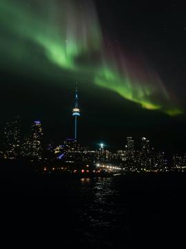 Toronto skyline under aurora