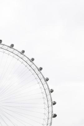 Ferris wheel  in a cloudy sky