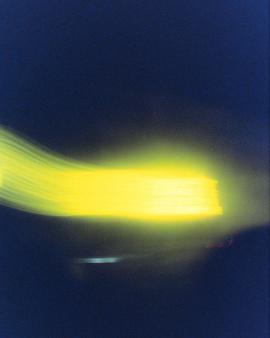 Long blurred lights at night. Shot on Cinestill 800T.