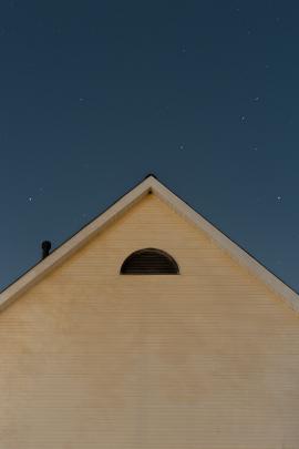 minimalistic shot of house at night