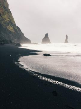 A moment on Reynisfjara, the black sand beach in southern Iceland. The beach can get quite populated with tourists but patience with the crowds allowed for this moment.