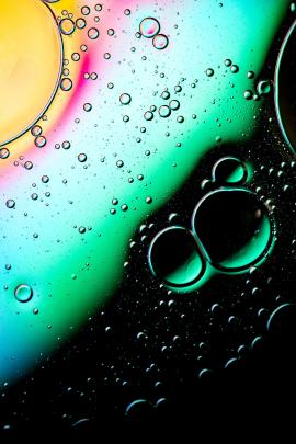 Water and oil droplets on glass panel