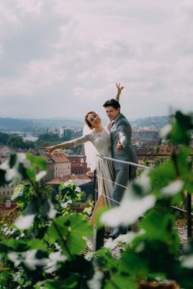 While visiting Prague castle, the cute couple were posing for pictures on the top of the city, in Prague castle’s entrance.