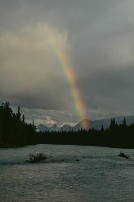 rainbow over the river in Jasper, Alberta, Canada 