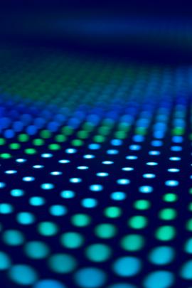 Shallow depth of field photo of an LED dance floor.