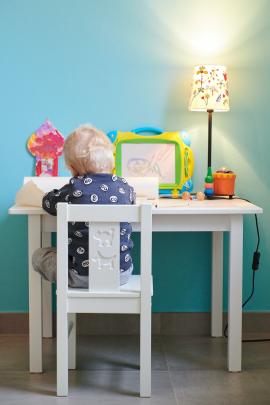 My 2 year old sun drawing on his small desk.