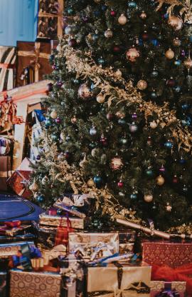 Grand Christmas tree surrounded by presents