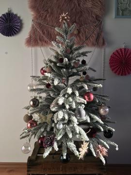 Fake christmas tree with ornaments.